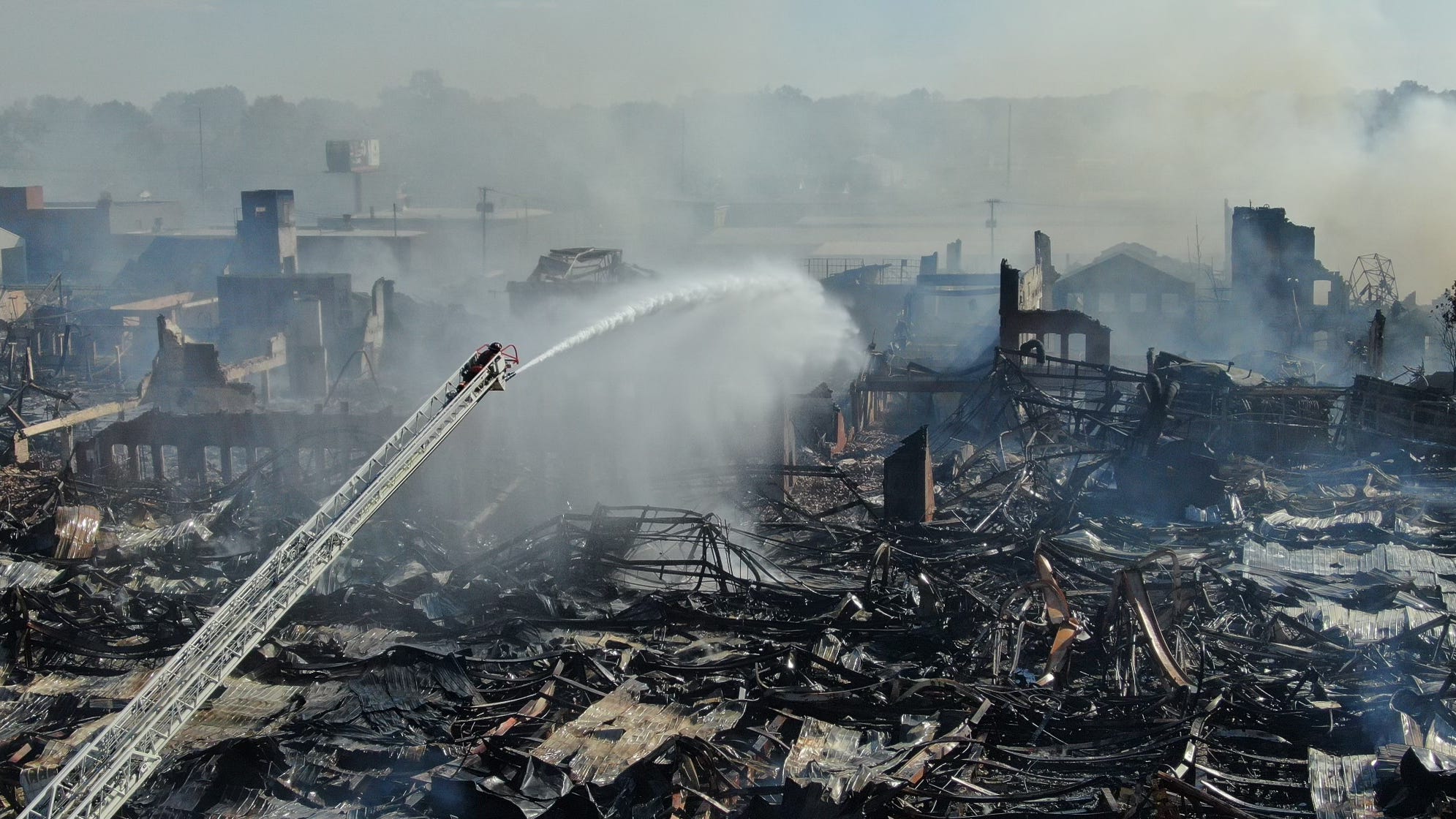 What caused the warehouse fire in Evansville on Morton Avenue?