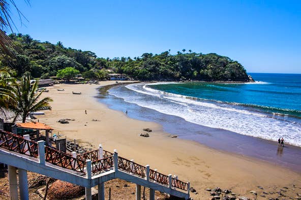 Forty minutes from San Blas via coastal Interstate 16, zigzagging the lush canopy jungle from Las Veras, is the serene fishing village and protected cove beach of Playa Platanitos. A few traditional Mexican restaurants serve the freshest catch of the day. Weekends can get busy quickly with locals arriving for the day. If you arrive midweek, you might have the beach all to yourself.