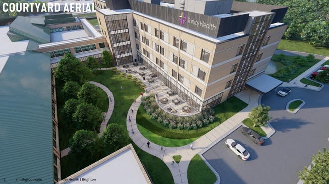 An architectural rendering shows a 4-story addition planned for the St. Joseph Mercy Brighton Health Center, which Trinity Health plans to expand into a full hospital.