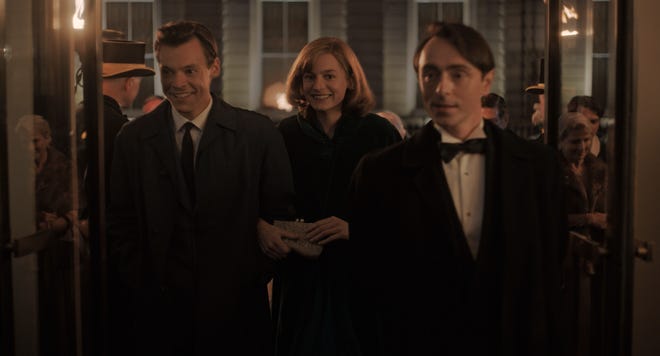Harry Styles (left) as Tom, Emma Corrin as Marion and David Dawson as Patrick in "My Policeman."