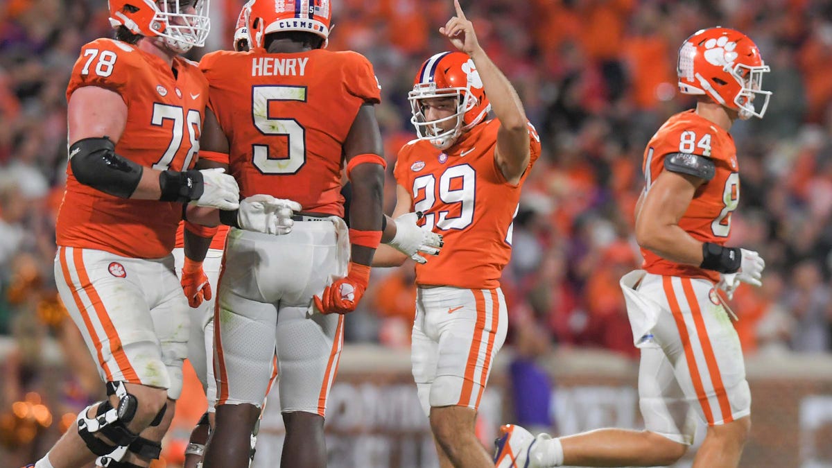 Clemson kicker B.T. Potter (29) reacts after making a field goal against North Carolina State during the fourth quarter at Memorial Stadium.