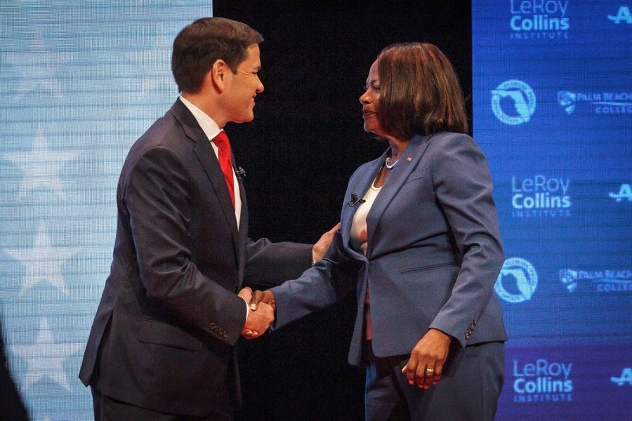 Sen. Marco Rubio (R-FL) and U.S. Rep. Val Demings (D-FL) greet each other before a televised debate at Duncan Theater an the campus of Palm Beach State College in Palm Beach County, Fla., on Tuesday, October 18, 2022. 