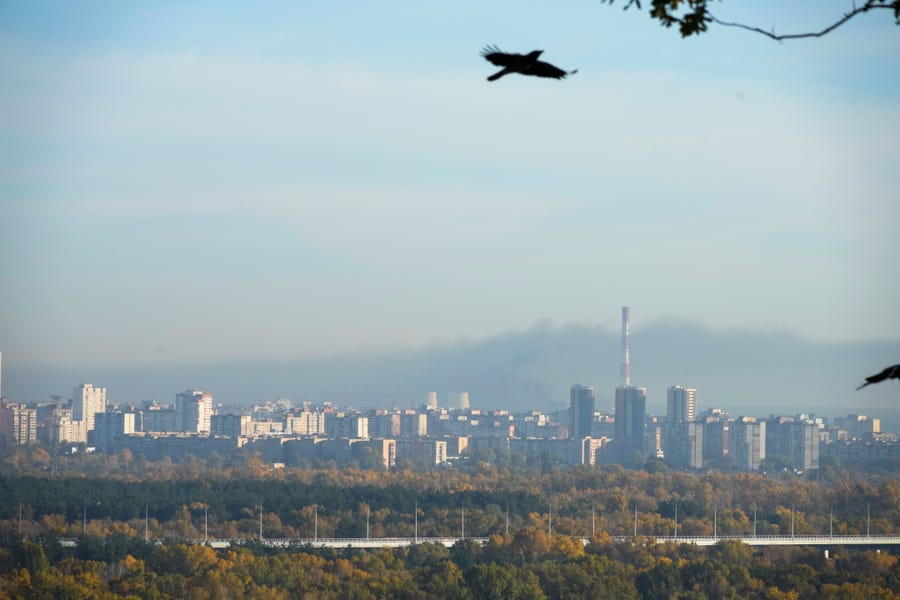 Smoke rises after Russian shelling in Kyiv, Ukraine, Tuesday, Oct. 18, 2022.