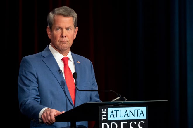 Georgia Republican Gov. Brian Kemp looks on during the Atlanta Press Club Loudermilk-Young Debate Series in Atlanta, Monday, Oct. 17, 2022.