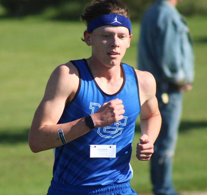 Senior Lars Huffman and the Mackinaw City boys cross country team captured the EUP title in Pickford on Monday.