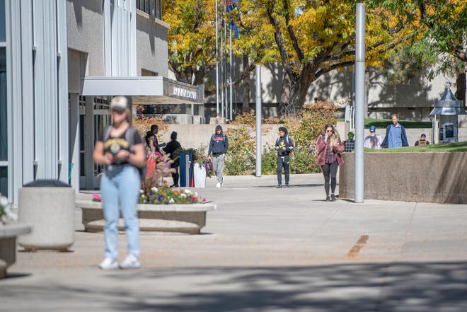 Students walk the campus at Colorado State University Pueblo on Wednesday, Oct. 19, 2022.