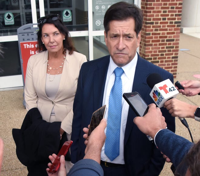 Delaware State Auditor Kathy McGuiness and her attorney Steve Wood making a statement to members of the media after she was sentenced for a misdemeanor conviction last year.