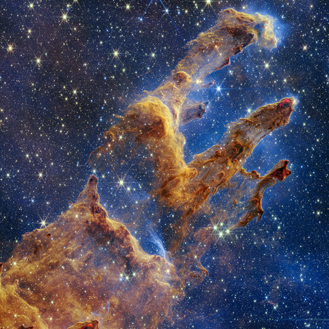 The Pillars of Creation are set off in a kaleidosc