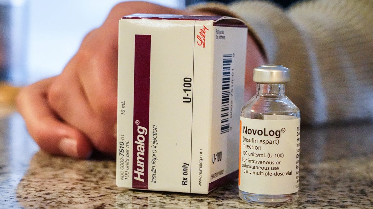 Type 1 diabetic, Hunter Sego, holds his insulin on Tuesday, Oct. 18, 2022, at his Indianapolis home. Sego, who is currently rationing insulin due to its high cost, has used both Humalog and NovoLog in the past.