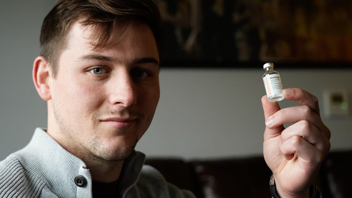 Type 1 diabetic, Hunter Sego, holds his insulin on Tuesday, Oct. 18, 2022, at his Indianapolis home. Sego, who is currently rationing insulin due to its high cost.