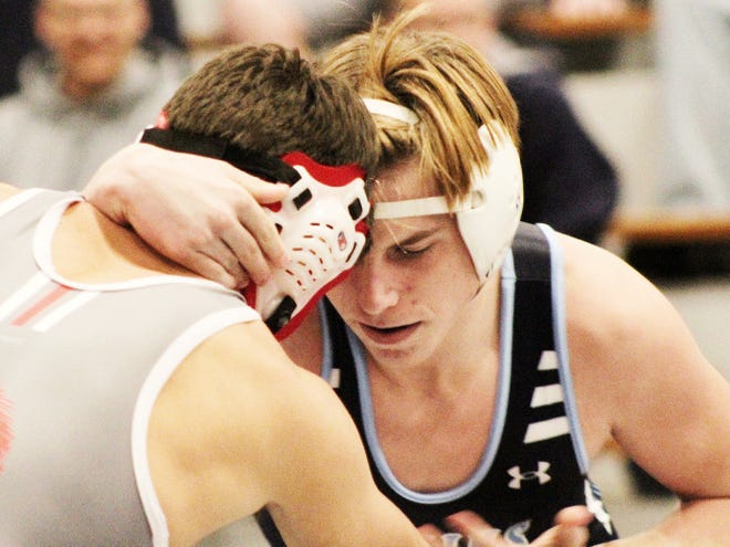 Bartlesville high's Mason Manley looks for an opening during wrestling action in the 2021-22 season.