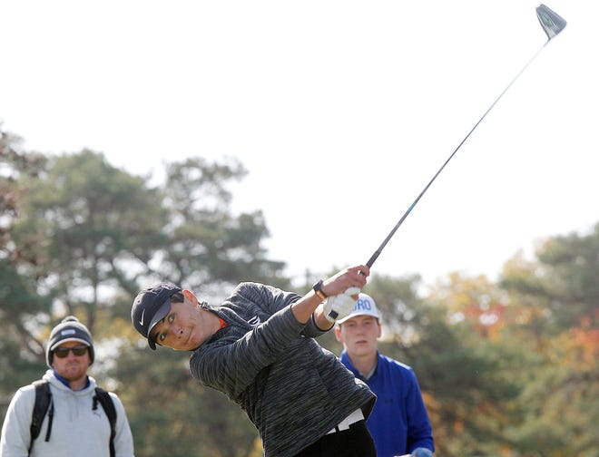 Green's Kyle Smith tees-off during the round one of the Division I Boys State Golf Championships at the Ohio State Golf Club Scarlet Course on Oct. 21.