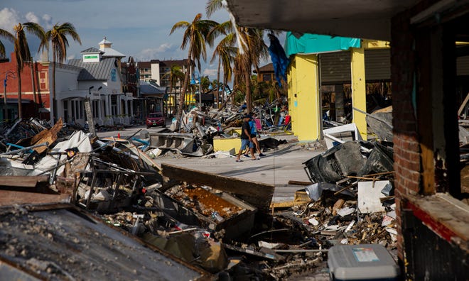 Fort Myers Beach was destroyed by Hurricane Ian on Sept. 28, 2022. This is the Times Square area on October 14, 2022. 
