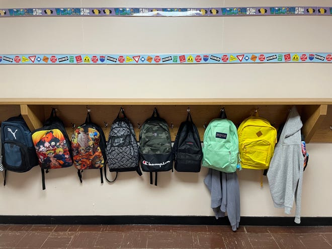 Backpacks are lined up at the Academy of Accelerated Learning in Milwaukee in September.