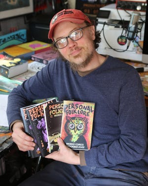 Local artist and illustrator Todd Peirce has several copies of his comic, Personal Folk Lore.