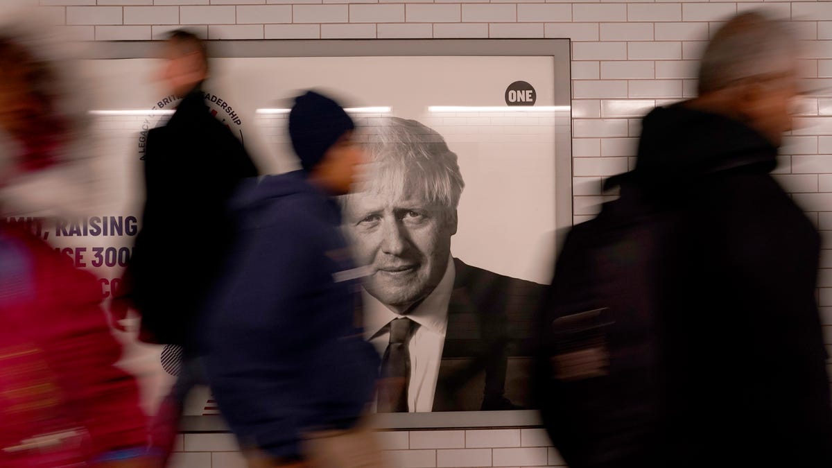 The face of former British Prime Minister Boris Johnson on an advertising hoarding at Westminster tube station in London, Friday, Oct. 21, 2022. British Prime Minister Liz Truss resigned Thursday, bowing to the inevitable after a tumultuous, short-lived term in which her policies triggered turmoil in financial markets and a rebellion in her party that obliterated her authority. Reports suggest that there will be three main contenders for the leadership Boris   Johnson, Rishi Sunk and Penny Mordaunt - Johnson would be trying to become Prime Minister for a second time.