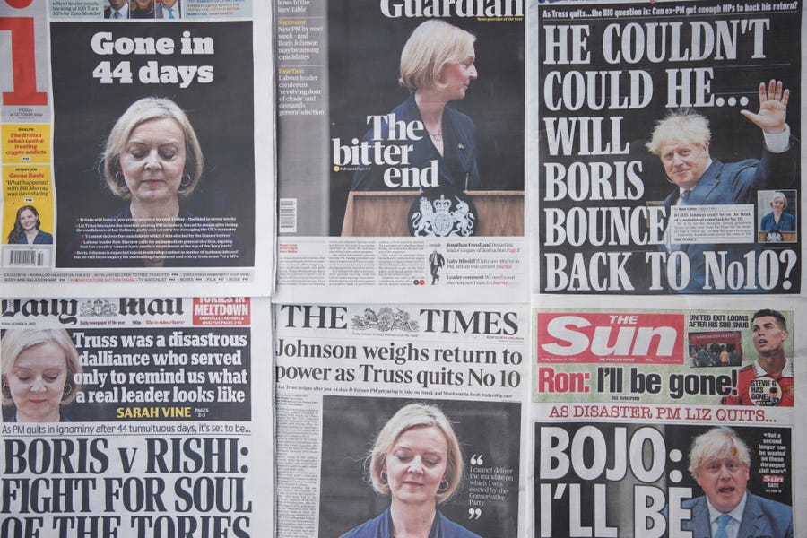 A selection of the front pages of British national newspapers showing the reaction the the resignation of Prime Minister Liz Truss, in central London, Friday, Oct. 21, 2022.