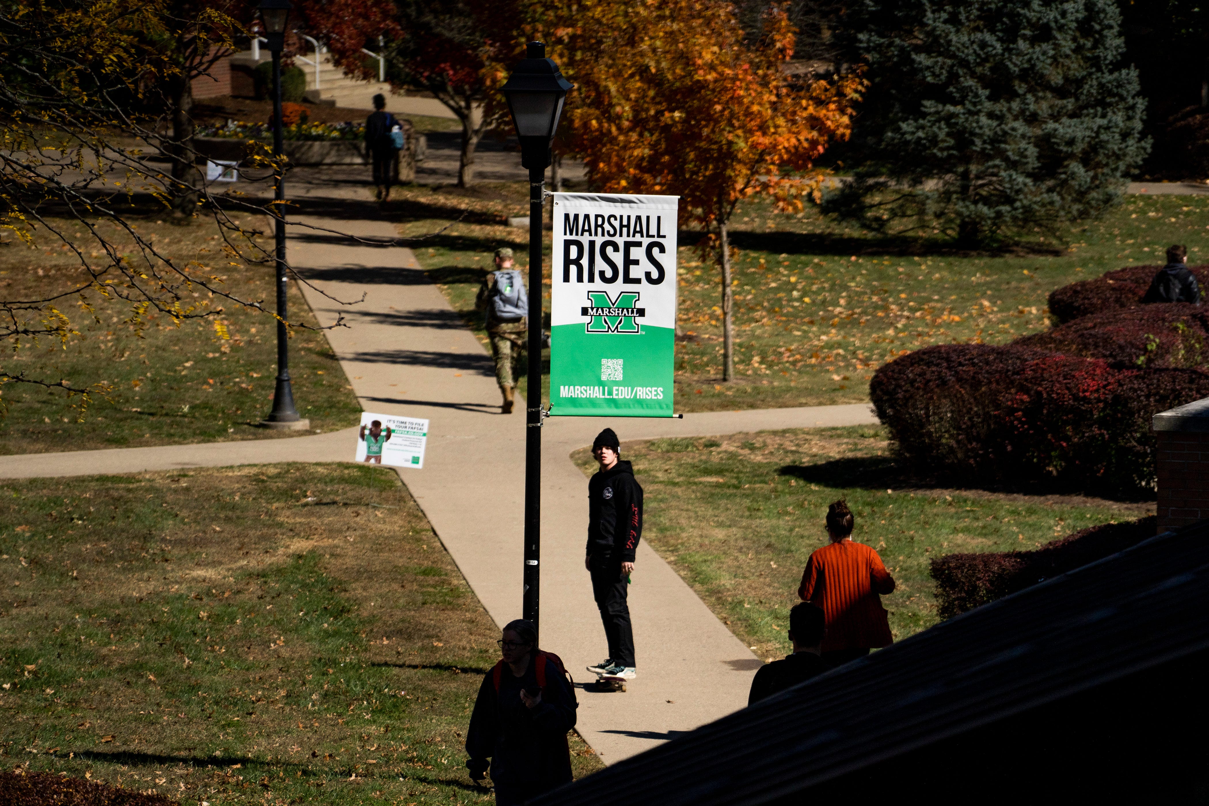 Students walk to class at Marshall University on October 20, 2022.