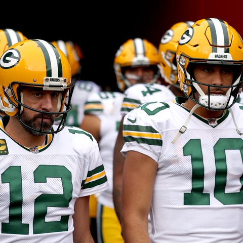 Green Bay Packers quarterbacks Aaron Rodgers and J