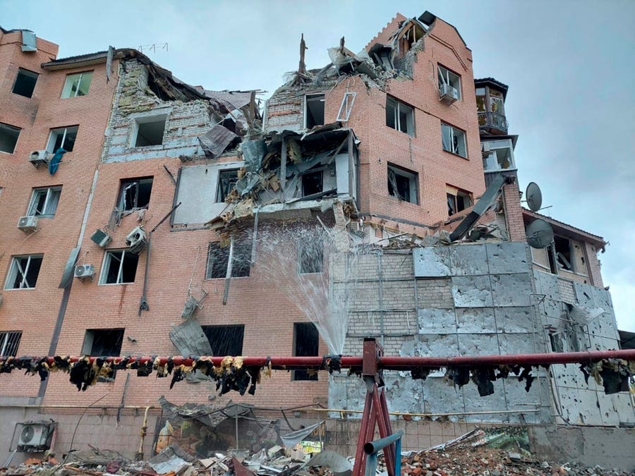 In this photo posted by the mayor of Mykolaiv on his Telegram channel, a residential building is seen damaged following night shelling in Mykolaiv, Ukraine, Sunday, Oct. 23, 2022.