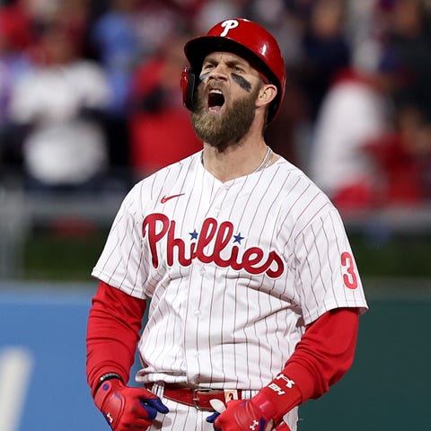 Game 4: Bryce Harper reacts after a double in the 