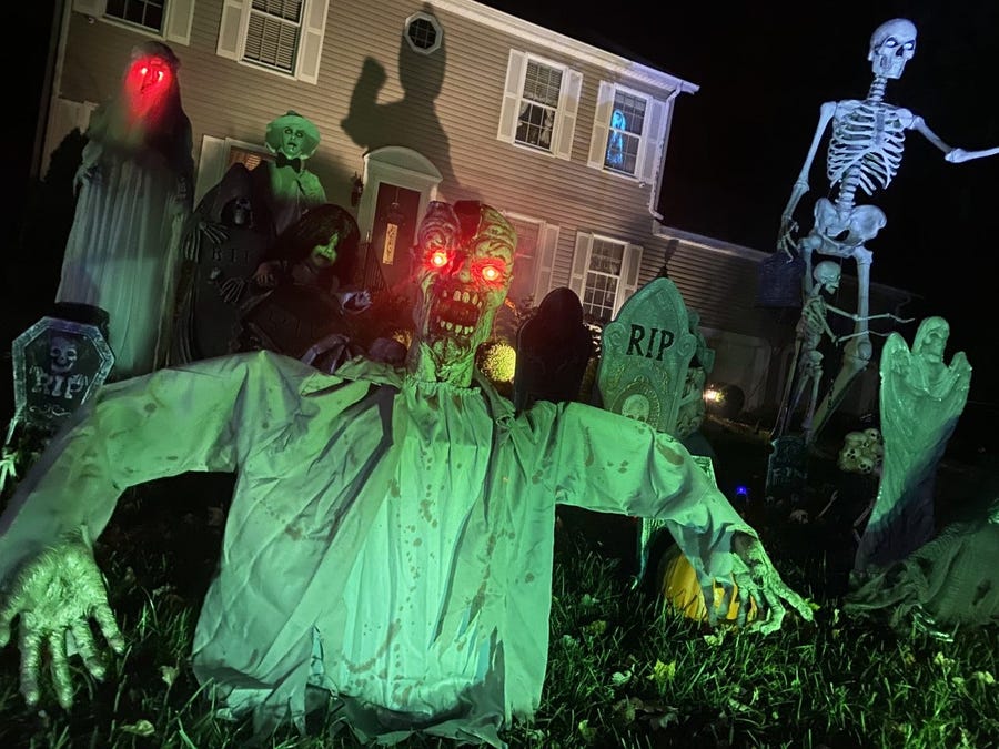 Taunton residents Eric and Michelle Kenney have created an over-the-top Halloween display at their home on Lori Lane in Taunton. The Kenneys welcome visitors to stop by and view the seasonal scene and are collecting donations of non-perishable food items for the Matthew Mission Food Pantry in Taunton. The Halloween display was at full power on Thursday, Oct. 20, 2022 and will be up and running through Halloween night.  