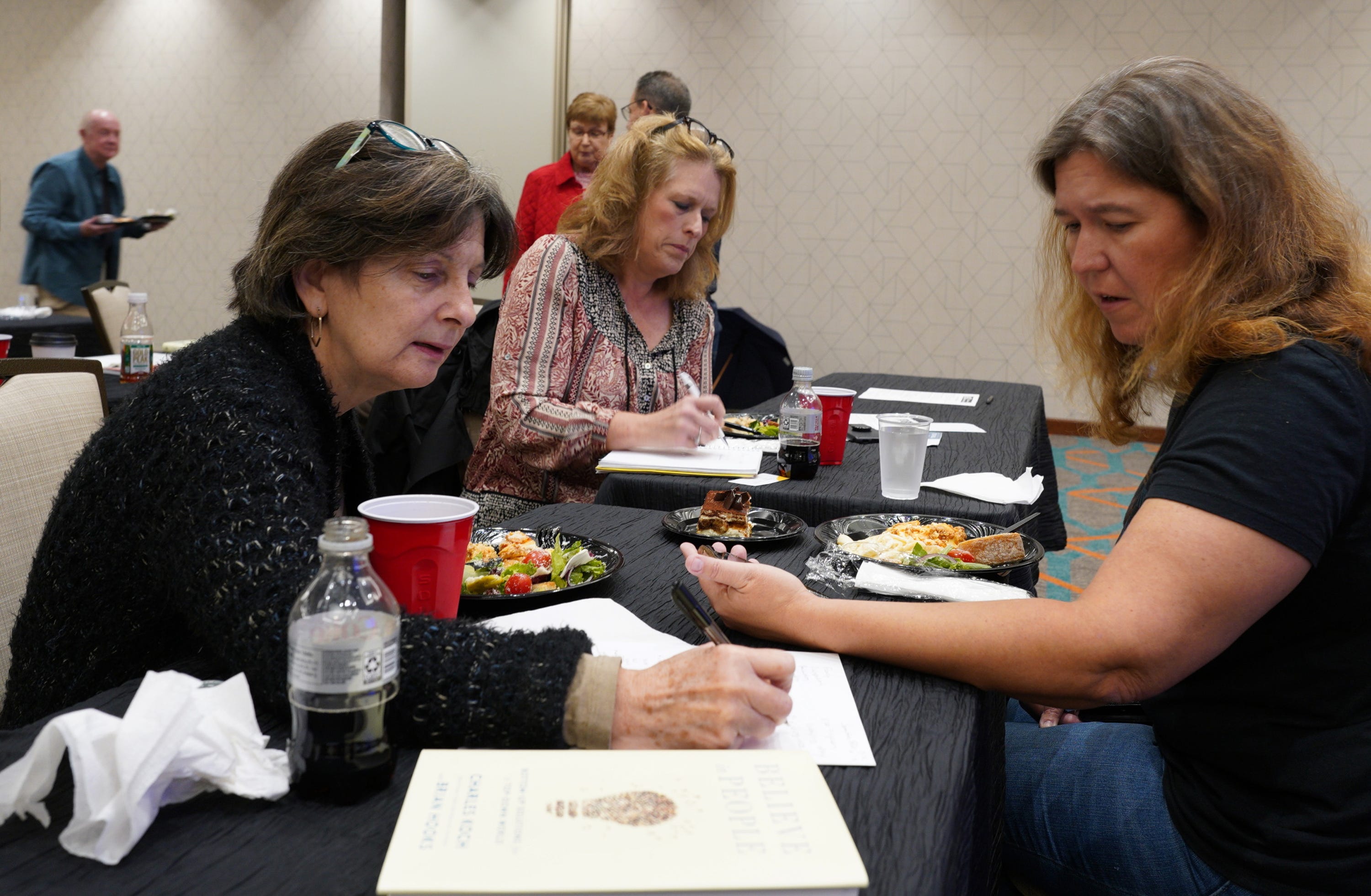 Barbara Phillips, Laura Fletcher and Celeste Garrett (left to right) share ideas during a lunch break at the Virginia Education Opportunity Alliance Saturday meeting which was offering free training for citizens to learn best practices to advance education choice.