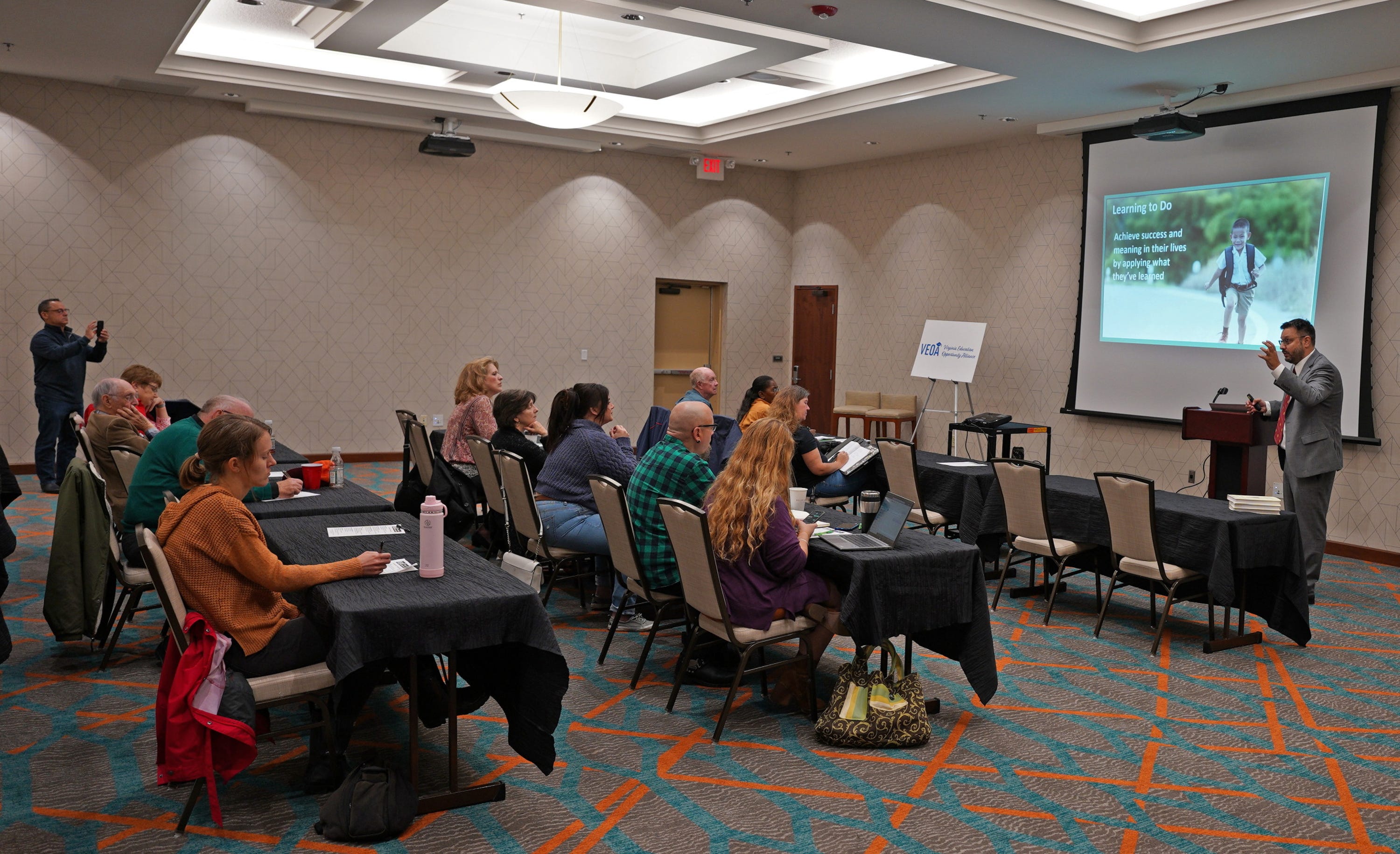Christopher Stio, grassroots trainer and curriculum specialist, talks to a small group attending the Virginia Education Opportunity Alliance Saturday meeting which was offering free training for citizens to learn best practices to advance education choice.