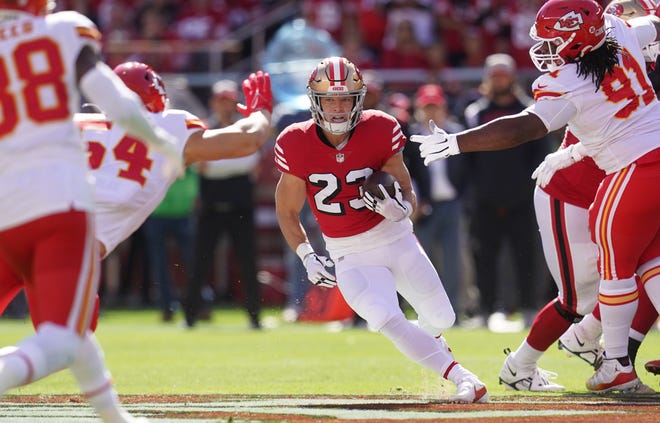 San Francisco 49ers running back Christian McCaffrey runs the ball against the Kansas City Chiefs.