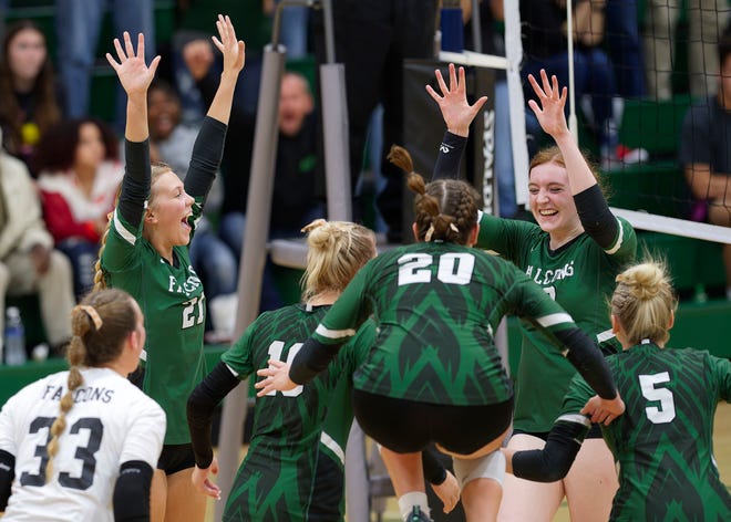Class 2A's 10th-ranked West Burlington volleyball team celebrates its win over Pella Christian in a regional semifinal Monday at West Burlington.