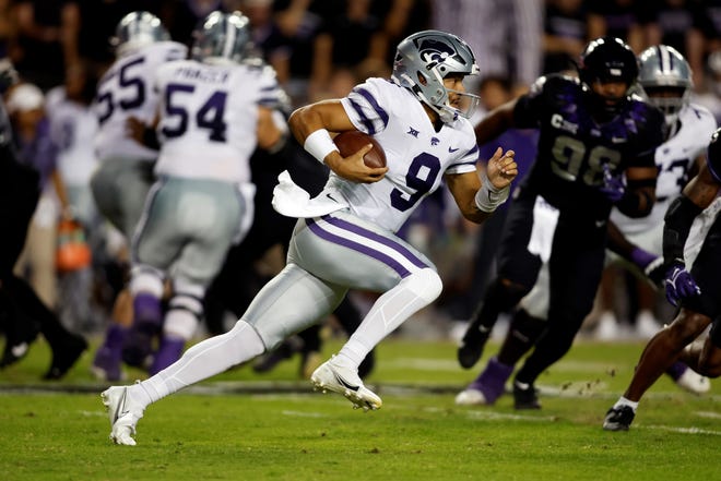 Adrian Martinez runs for a first down on the first play of the game Saturday at TCU. Martinez lasted just one series before suffering an injury, and his status remains uncertain for this this week against Oklahoma State.