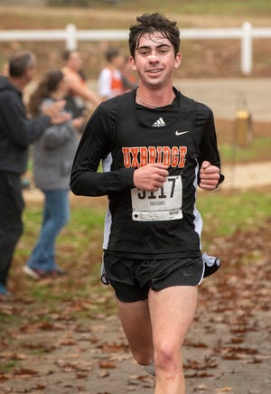 Uxbridge senior Aidan Ross repeated at Division 3 All-State boys' cross-country champion.