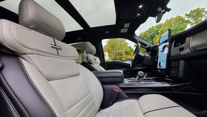 The 2022 Ford F-150 Lightning offers a panoramic roof, leather seats and a big tablet screen.