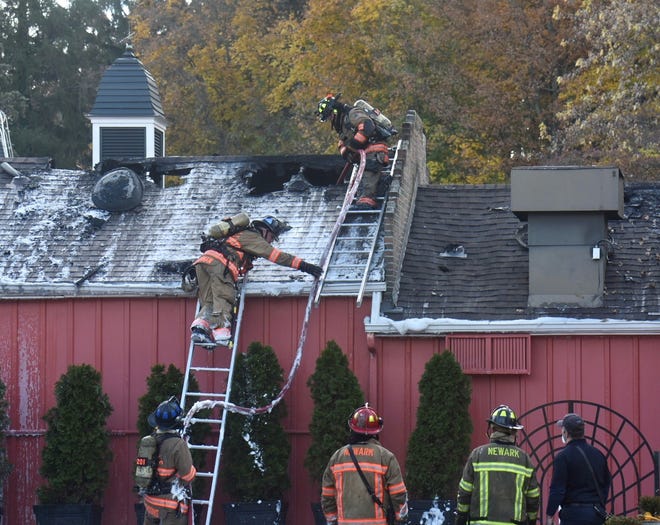 Multiple fire crews responded to a two-alarm fire at the Buxton Inn in Granville on Oct. 25, 2022.