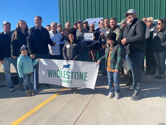 Wholestone members assemble for a ribbon cutting on the company's "custom slaughterhouse" in Sioux Falls