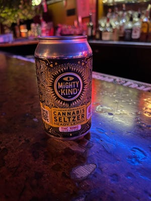 Joshua Grigaitis owns a cannabis-infused seltzer business in St. Louis called Mighty Kind. The flavored drinks contain a small amount of hemp-derived delta-9 THC. His products comply with a federally imposed limit, he says, which allows him to sell his products despite marijuana being illegal in Missouri.