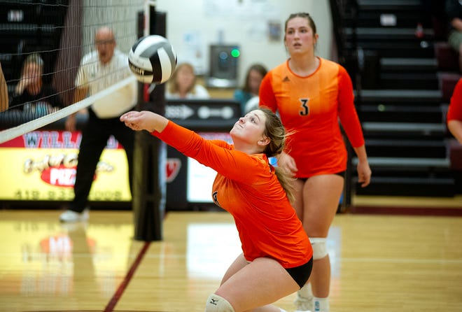 Lucas' Maleigha Strickler keeps the ball in play during the Cubs' 3-0 district semifinal loss to Seneca East on Tuesday night at Willard High School.