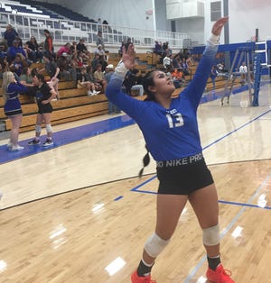 Carlsbad Cavegirl volleyball player Kalion Fuentes practices before a district match against Clovis on Oct. 25, 2022.