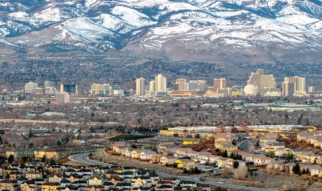 City of Reno cityscape at sunrise in the winter.