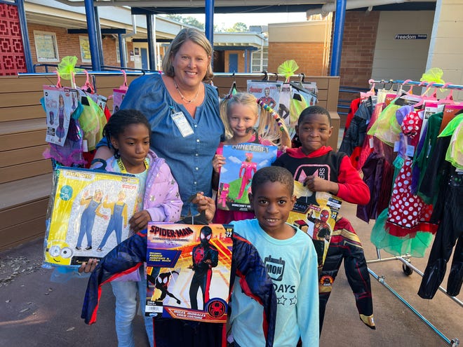 Scott and Wallace law firm delivered Halloween costumes to Sabal Palm, Astoria Park and Pineview  elementary schools on Oct. 25, 2022.