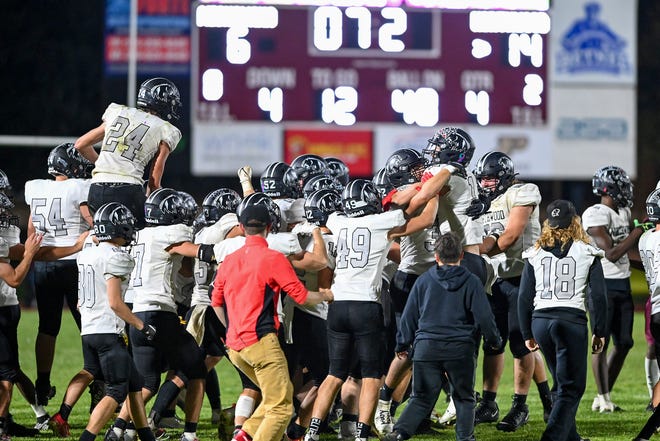 The Northwood Panthers celebrate as time expires in their 14-6 win over Mishawaka Friday, Sept. 30, 2022, at Steele Stadium.