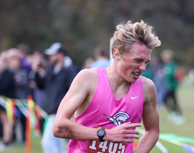 West Salem’s Jack Meier crosses the finish in first place during the CVC District Championships at Bush’s Pasture Park on Wednesday, Oct. 26, 2022 in Salem, Ore. 