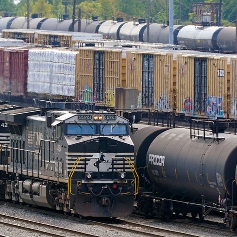 FILE - Norfolk Southern locomotives work in the in