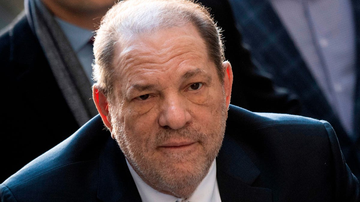 (FILES) In this file photo taken on February 24, 2020 Harvey Weinstein arrives at the Manhattan Criminal Court, in New York City. - Harvey Weinstein's sex crimes conviction was a "great victory" for women, US President Donald Trump said February 25, 2020 -- without acknowledging the numerous accusations of sexual misconduct he has faced. The disgraced Hollywood movie producer was found guilty on Monday of rape and sexual assault in a verdict hailed as   a historic landmark by the #MeToo movement against sexual misconduct."From the standpoint of women, I think it was a great thing," Trump said at a news conference in India. (Photo by Johannes EISELE / AFP) (Photo by JOHANNES EISELE/AFP via Getty Images) ORIG FILE ID: AFP_1PB0P0