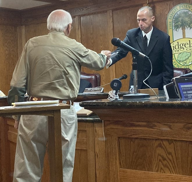 Ridgeland resident Milton Woods handed Town of Ridgeland Mayor Joey Malphrus a petition with more than 1,700 signatures from citizens who oppose the recent annexation request from Tickton Hall investments, LLC and Pepper Hall, LLC to annex 1,500 acres of Tickton Hall into the Town of Ridgeland.