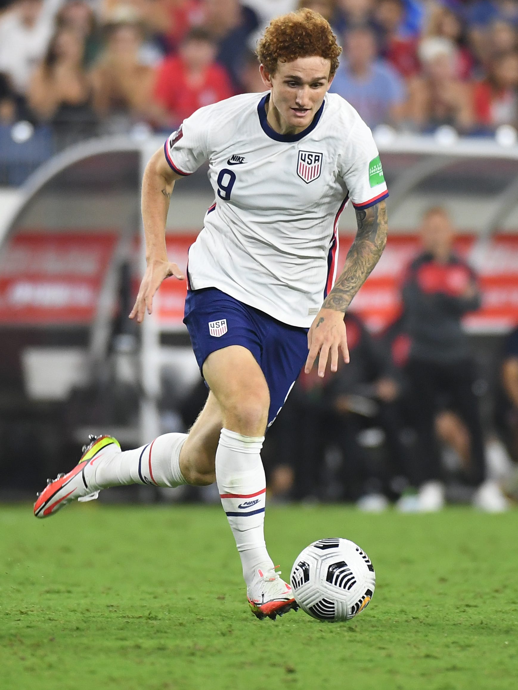 An action image of Josh Sargent  playing soccer.