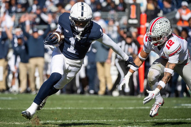 Penn State wide receiver KeAndre Lambert-Smith (1) gets past Ohio State safety Lathan Ransom (12) on his way to a 23-yard touchdown score in the second quarter at Beaver Stadium on Saturday, Oct. 29, 2022, in State College.