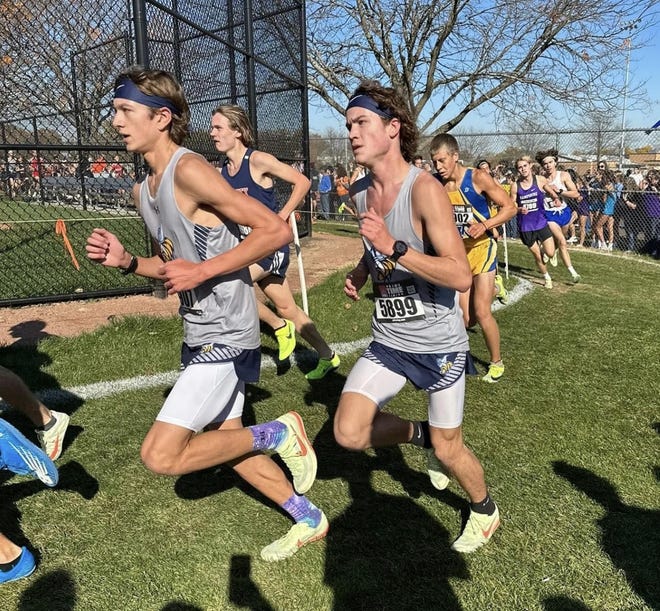Guilford's Brandon Lawson, left, and Landon Bachta take a turn during the Class 3A sectional race in Roselle on Saturday, Oct. 29, 2022. The pair helped Guilford qualify for state as a team.