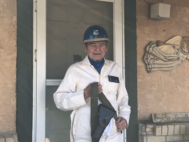 Lane Maxwell stands outside his Pueblo home in the uniform he wore during the Cuban missile crisis in October 1962.