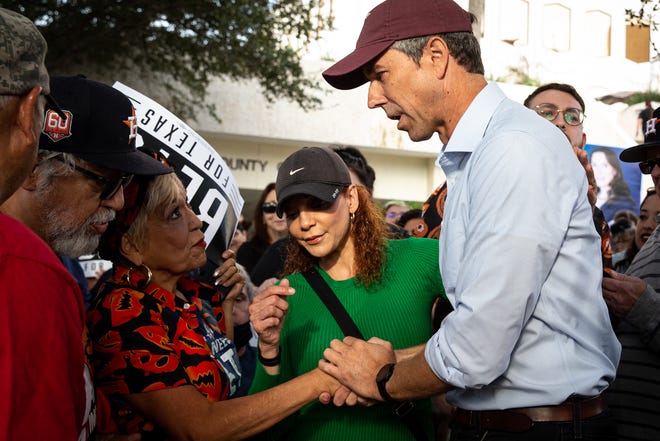 Texas gubernatorial candidate Beto O'Rourke shakes hands with Elizabeth Leal, 61, of Corpus Christi, outside of the Nueces County Courthouse after speaking during a campaign stop on Monday, Oct. 31, 2022, in Corpus Christi, Texas.